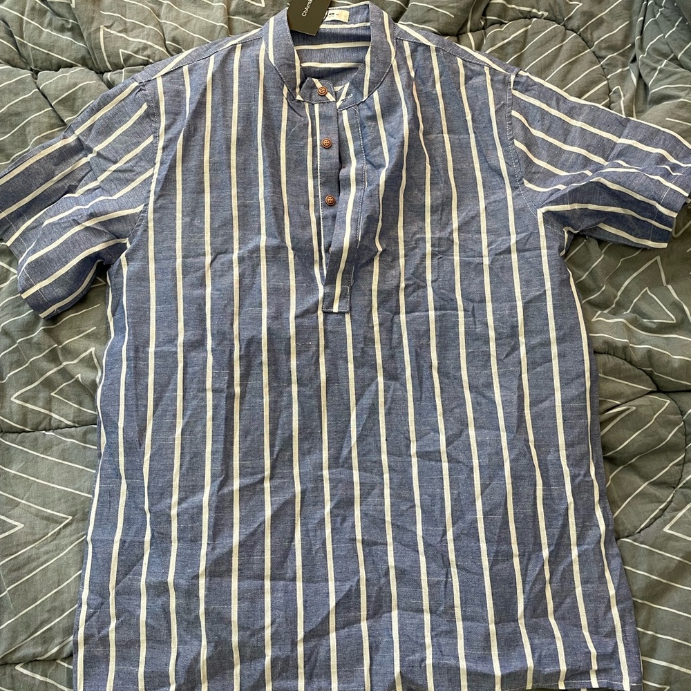 Medium shirt, but runs bigger, may fit more like large